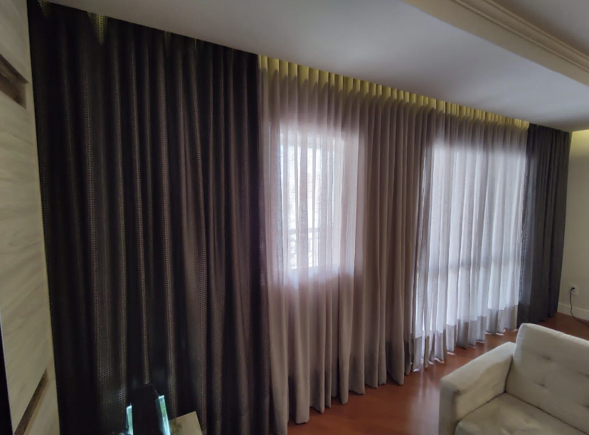 Ambiente decorado com cortinas Oasis